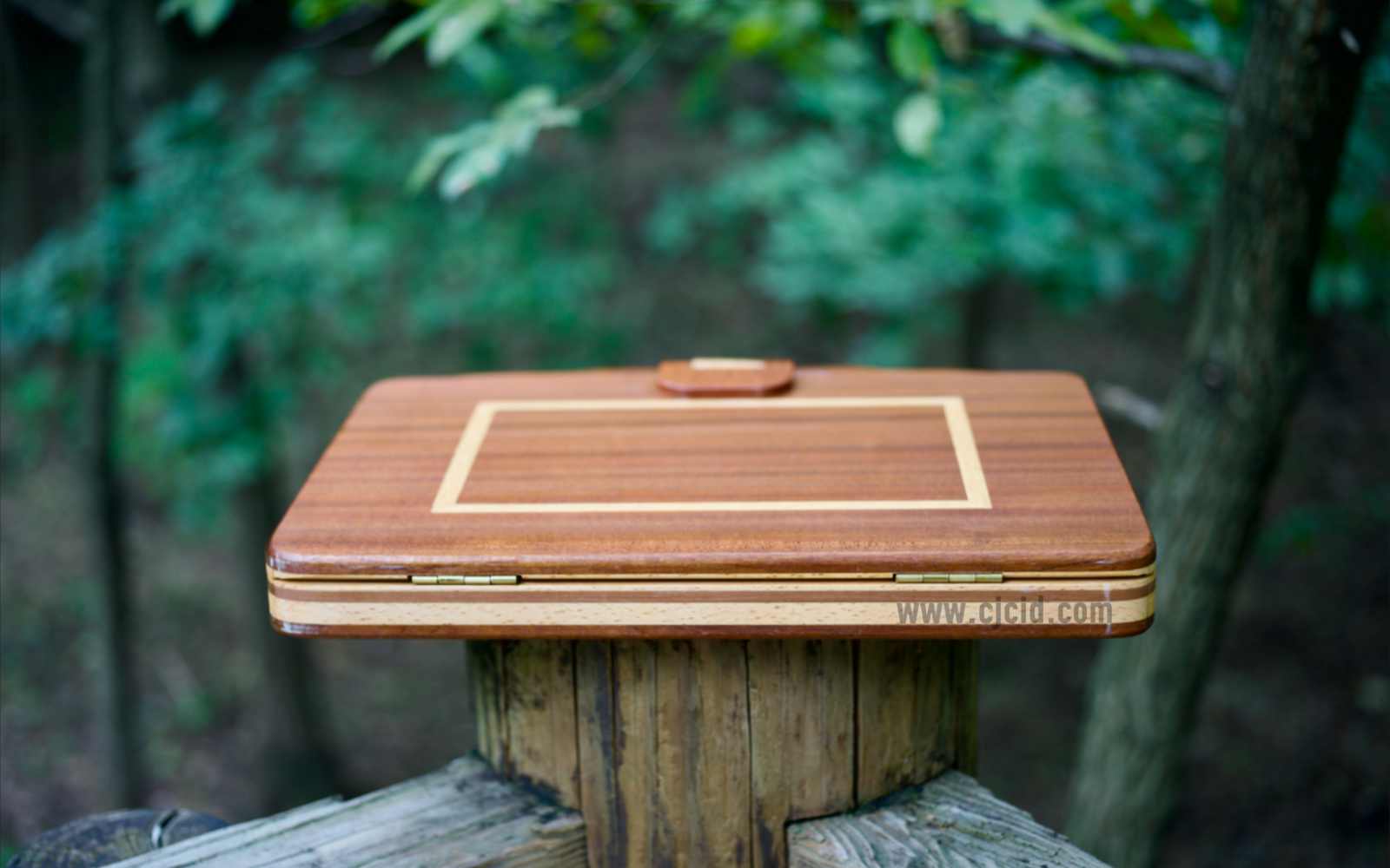 Bottom view of the hinges of the handcrafted solid wood attaché case for the 15″ Apple MacBook Pro