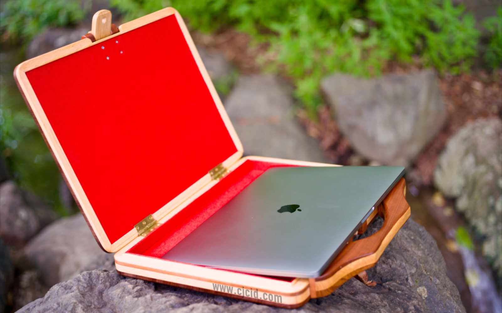 Open lid view with the laptop slightly removed, of the handcrafted solid wood attaché case for the 15″ Apple MacBook Pro