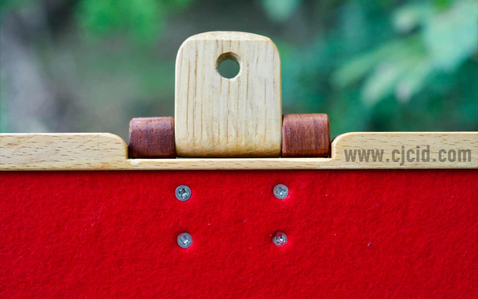 Detail view of the latch from inside with open lid, of the handcrafted solid wood attaché case for the 15″ Apple MacBook Pro