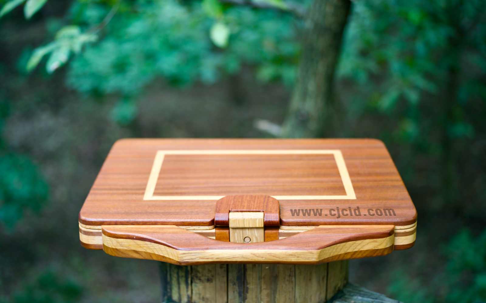 Top–front view of the handcrafted solid wood attaché case for the 15″ Apple MacBook Pro