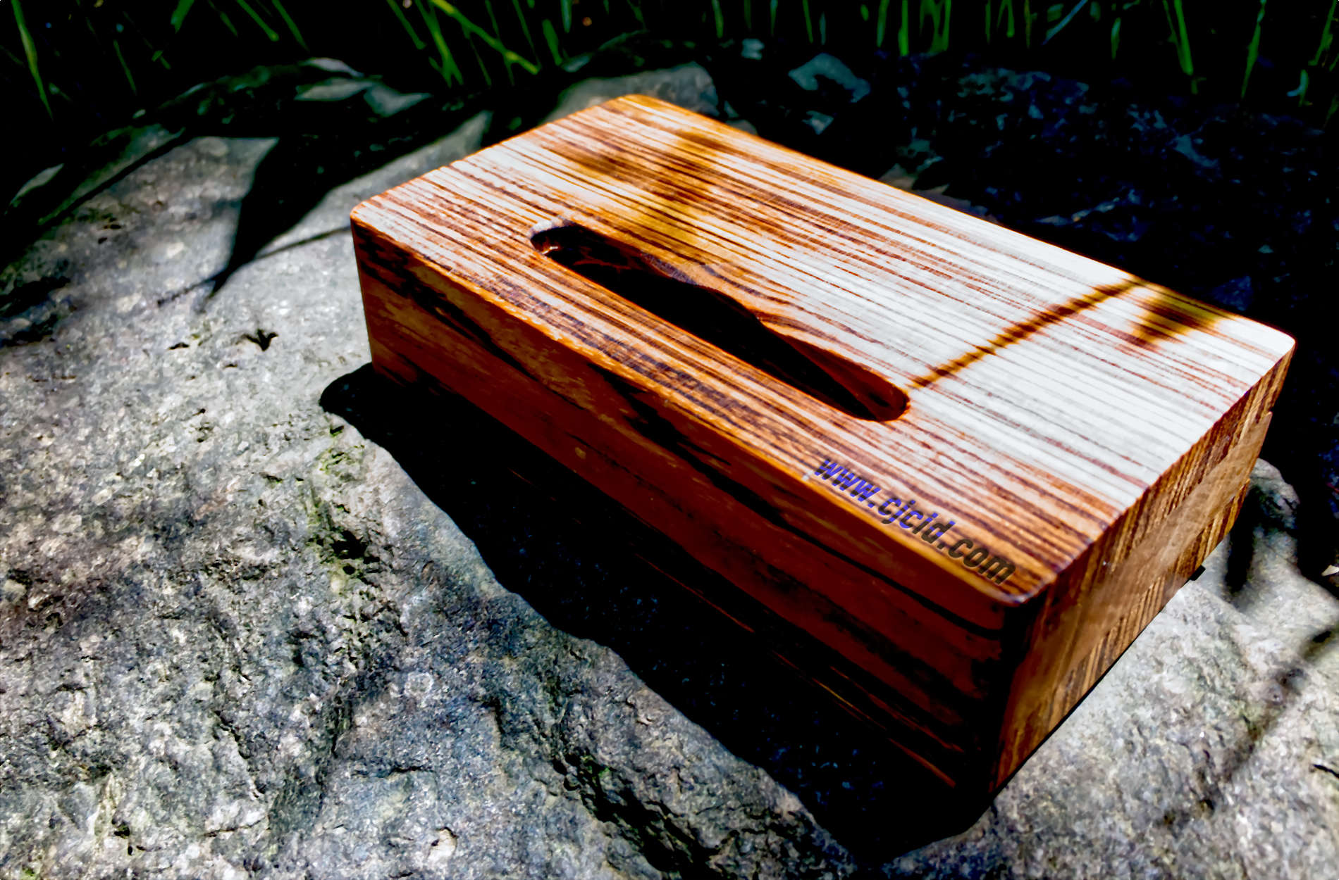 Back side view of the handmade wooden iPhone stand and passive amplifier speaker “CJ Monster Mouth”