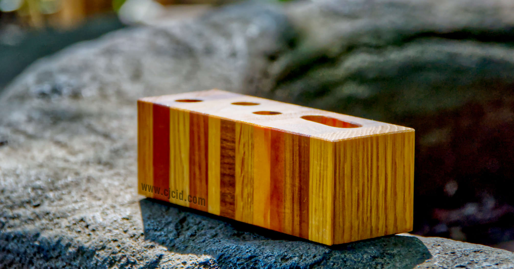 Side view of the handmade wooden pen holder “CJ Triplet Cuboid”